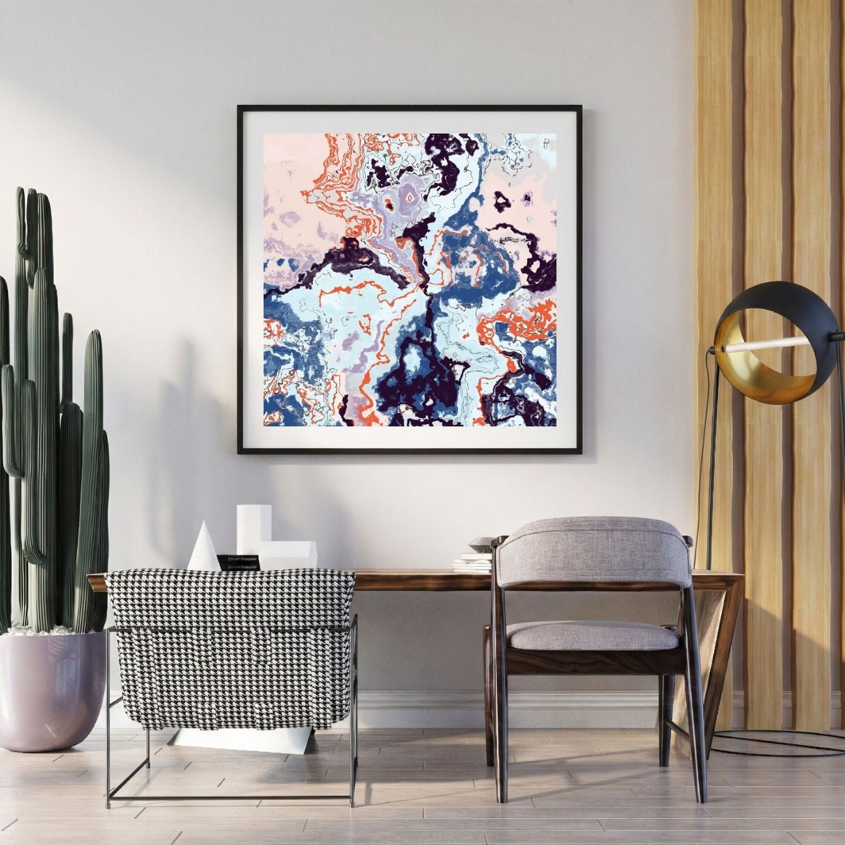 Modern interior with a abstract art print on the wall, chair, and potted plant.