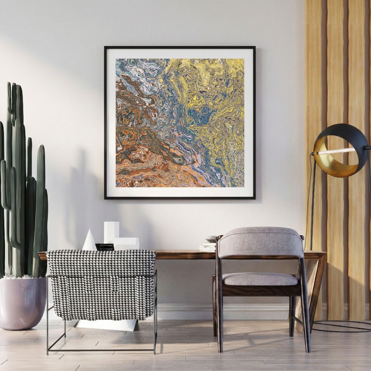 Modern interior with a abstract art print on the wall, chair, and potted plant.