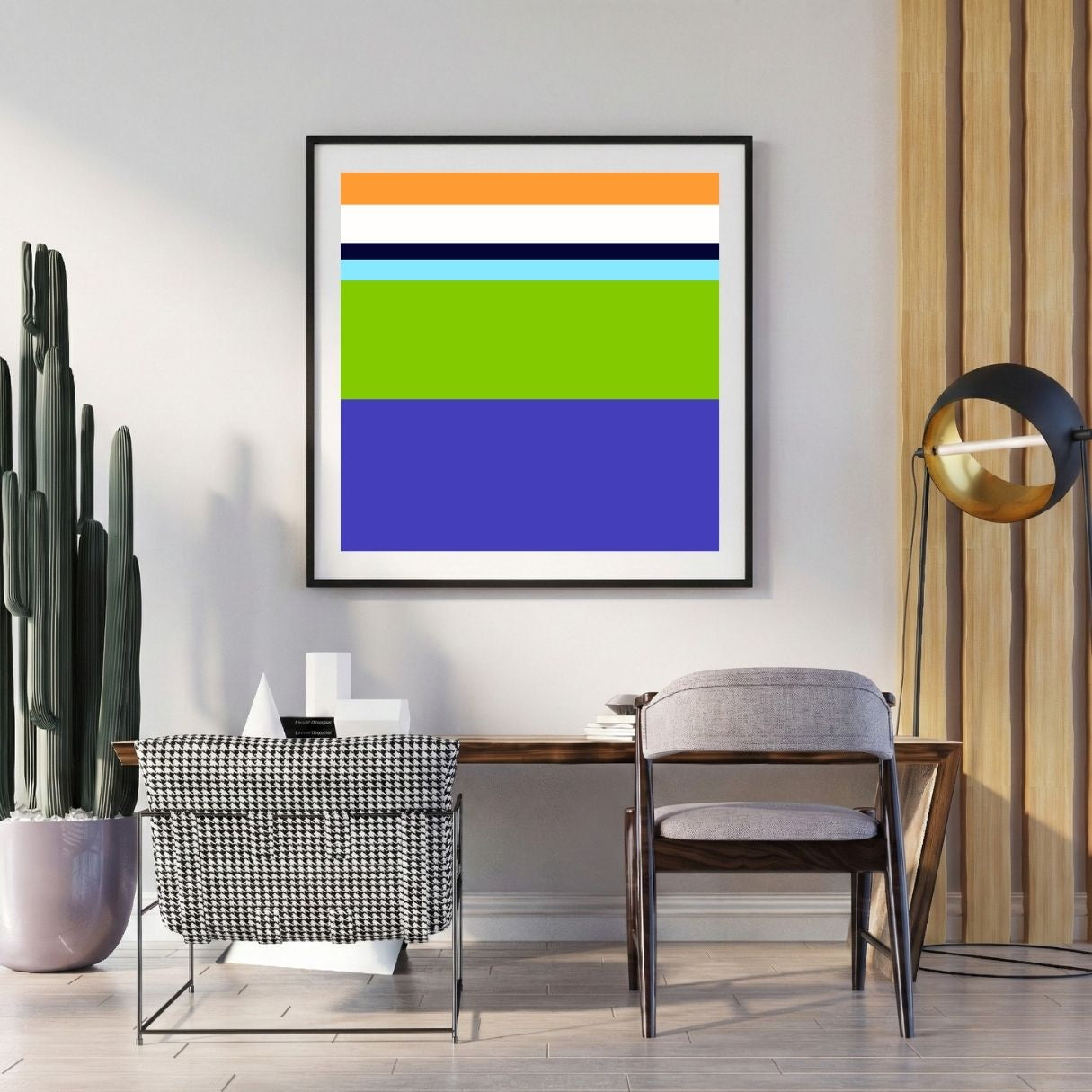 Modern interior with a colorful abstract painting on the wall, a desk, and chairs.