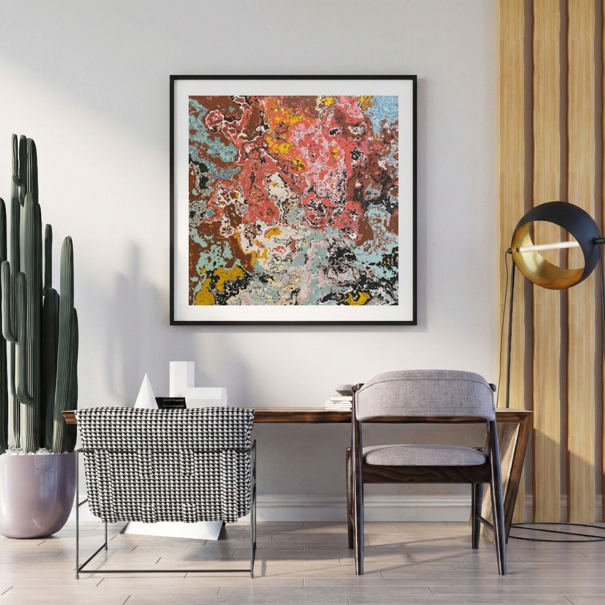 Modern interior with a abstract art print on the wall, chair, and potted plant.