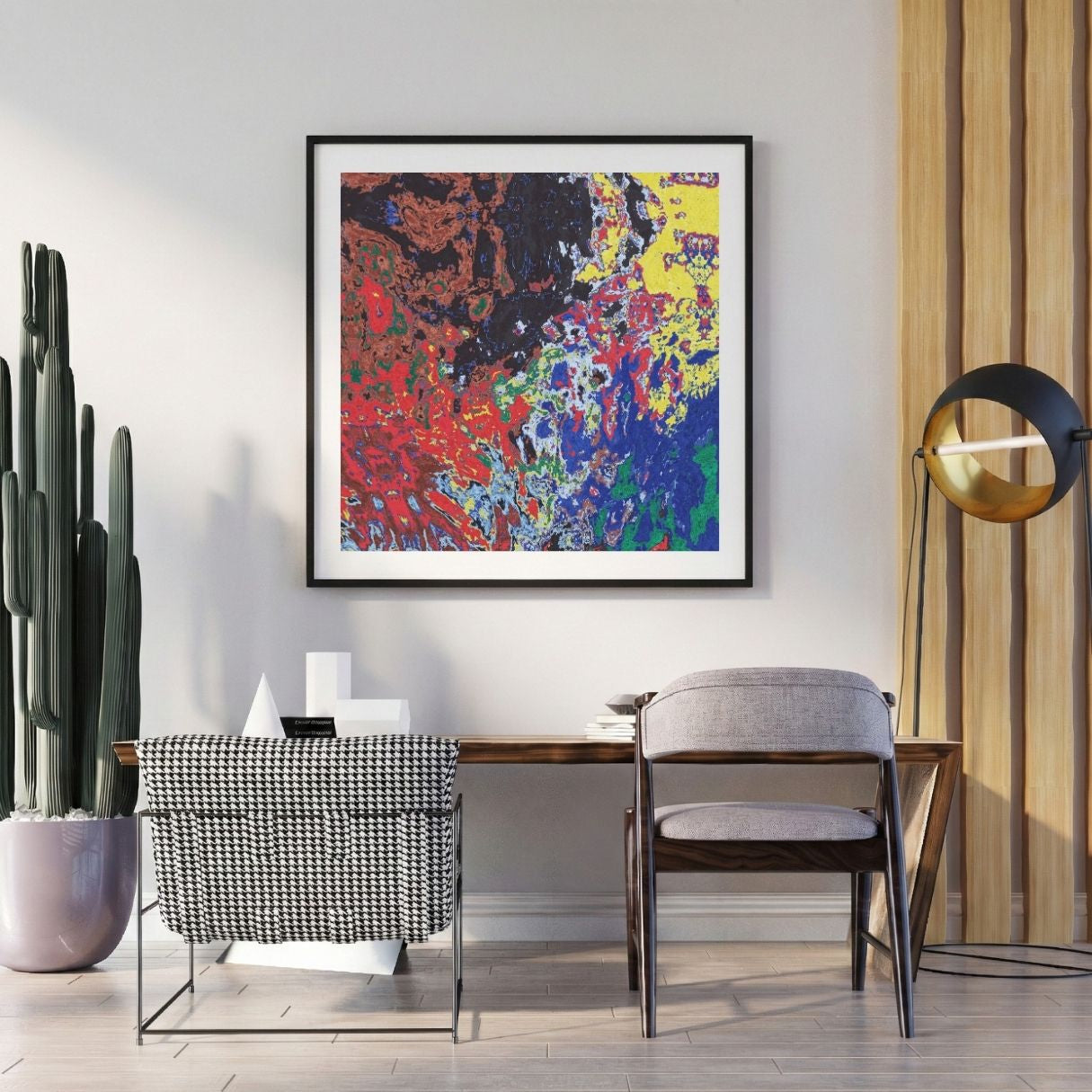 Modern interior with a colorful abstract print on the wall, a desk, and chairs.
