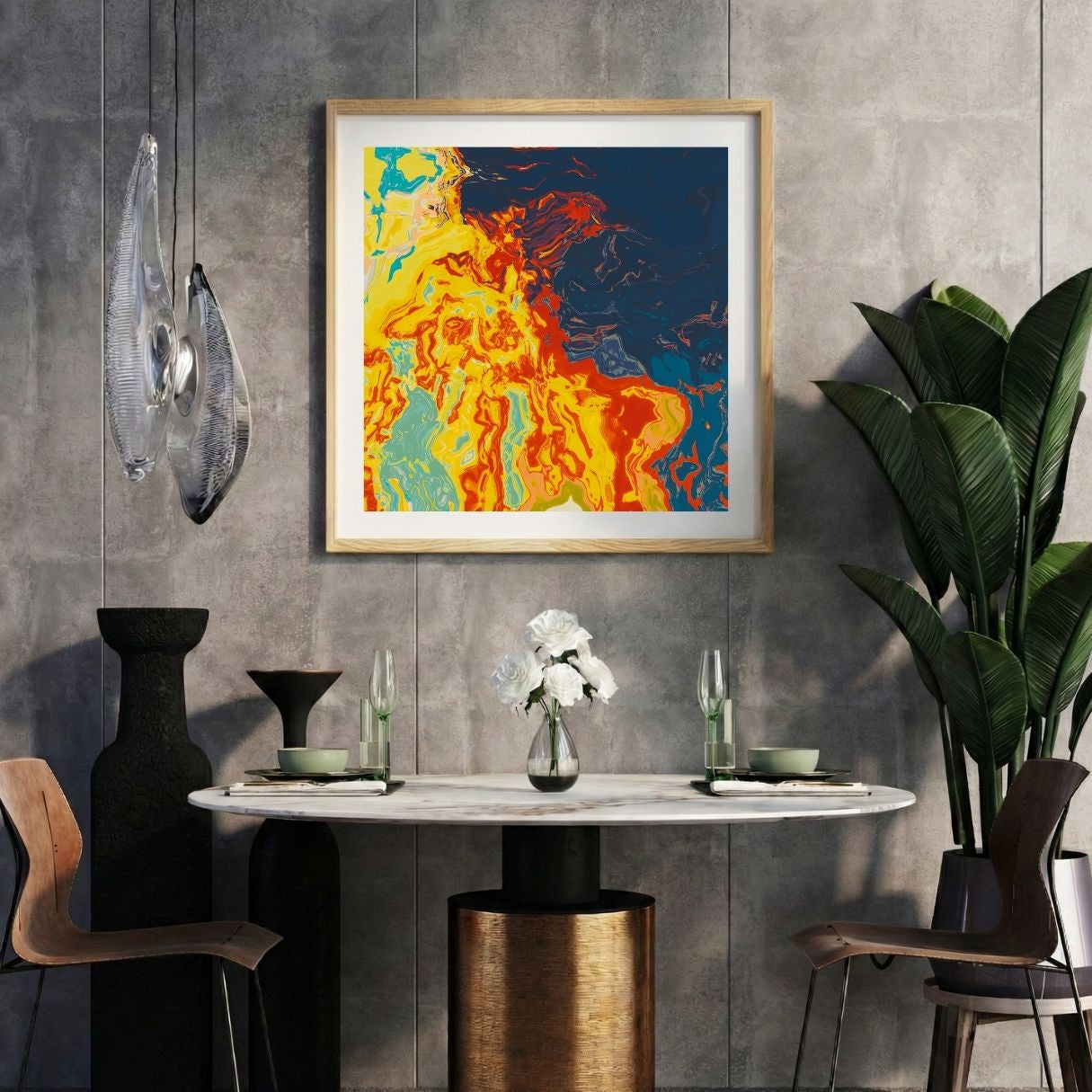 Modern interior with a marbled orange blue abstract print on a gray wall, marble table, and decorative items.