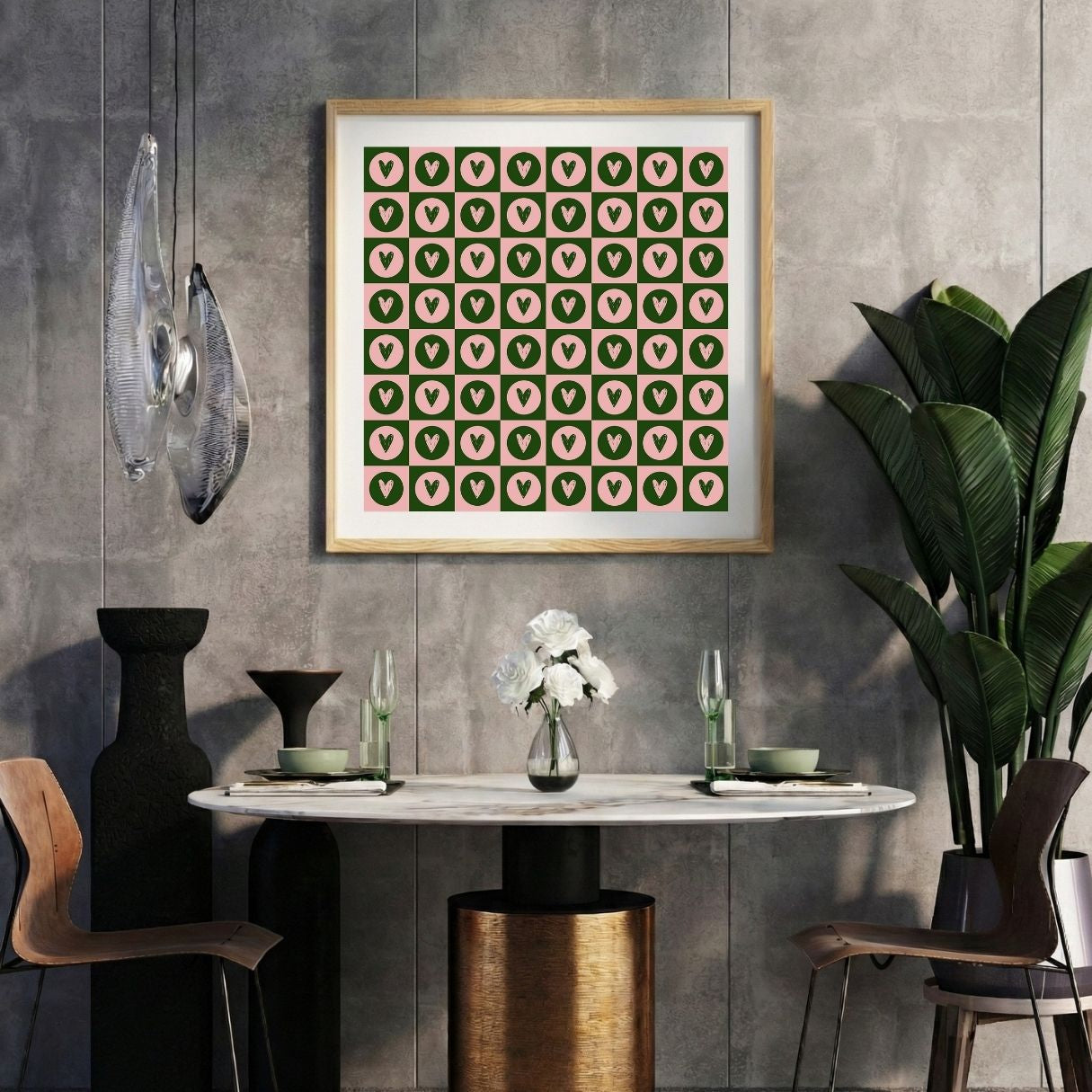 Modern interior with a ornamental heart dot abstract print on a gray wall, marble table, and decorative items.