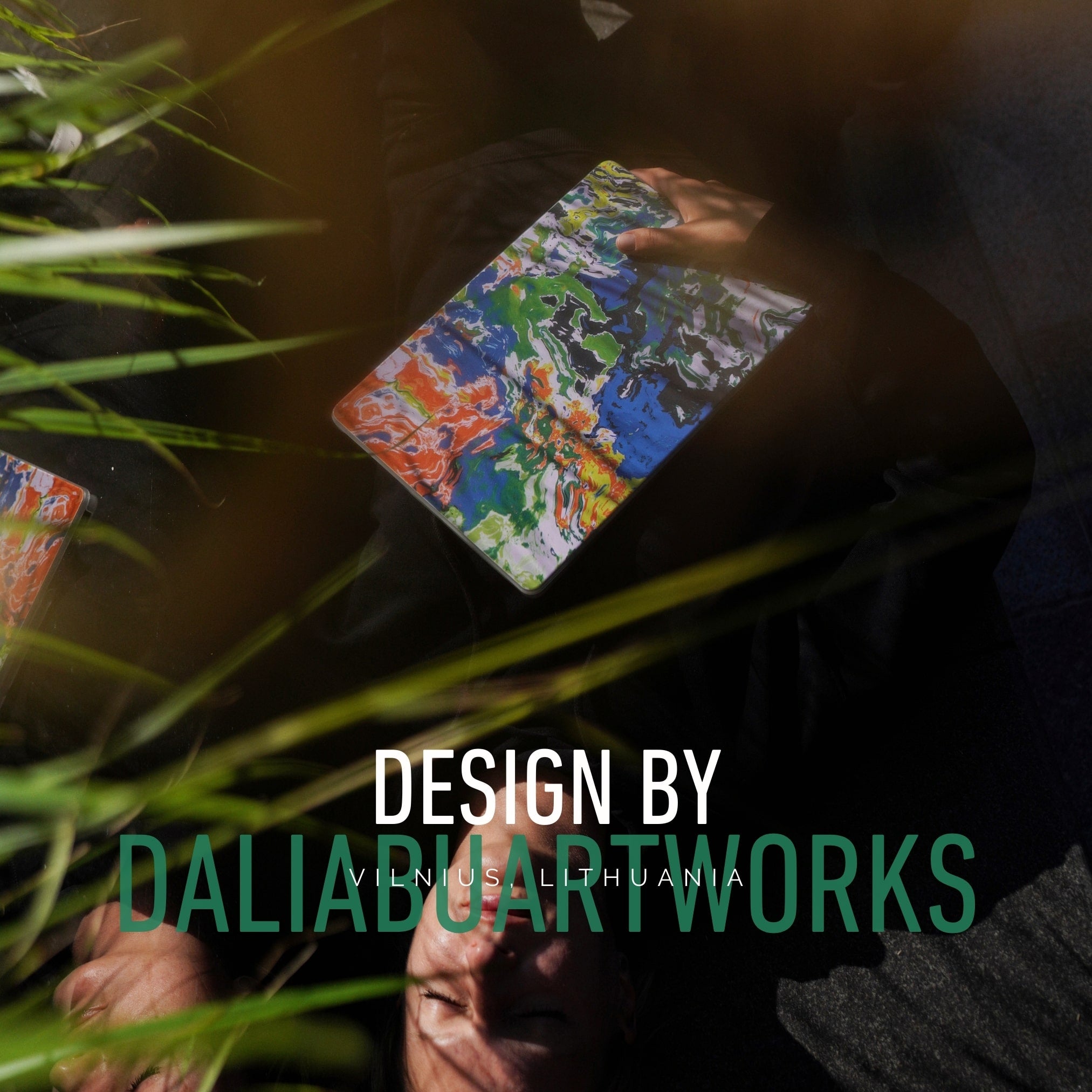 Colorful card held by a person with 'Design by Dalia Buartworks' text overlay.