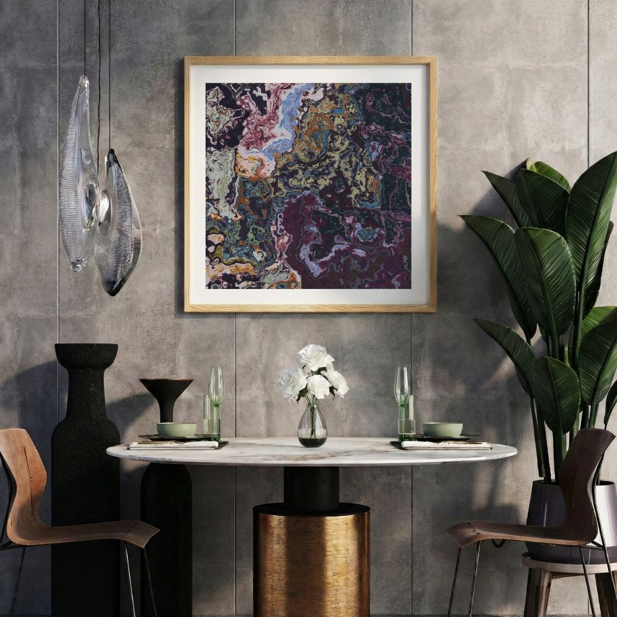 Modern interior with a purple abstract print on a gray wall, marble table, and decorative items.