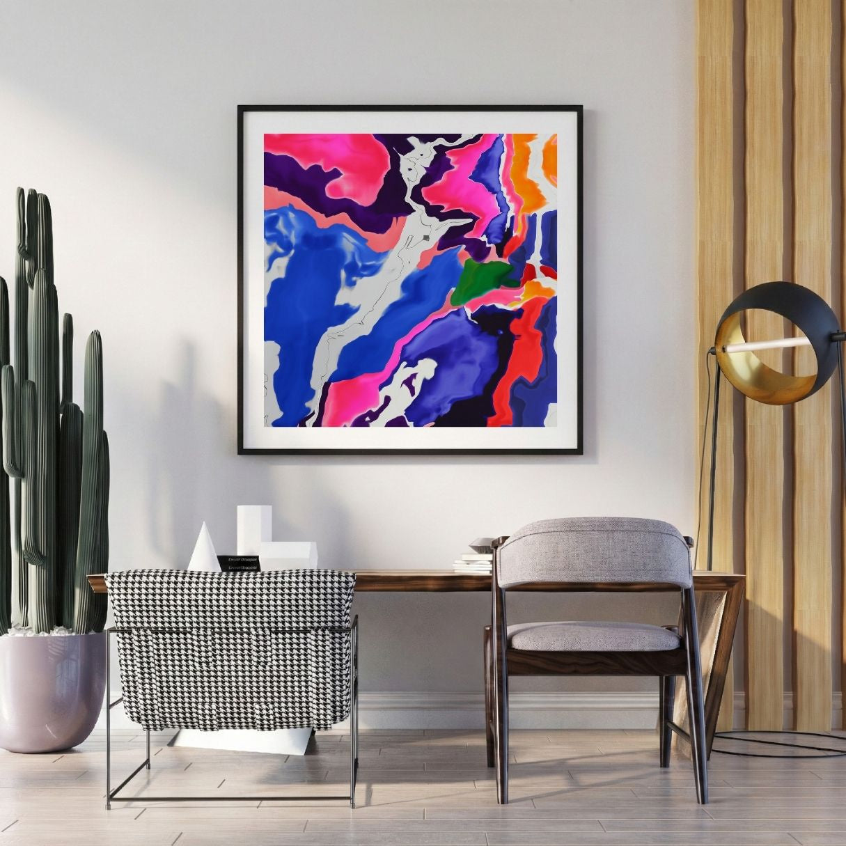 Modern interior with a colorful purple abstract print on the wall, a desk, and decorative items.