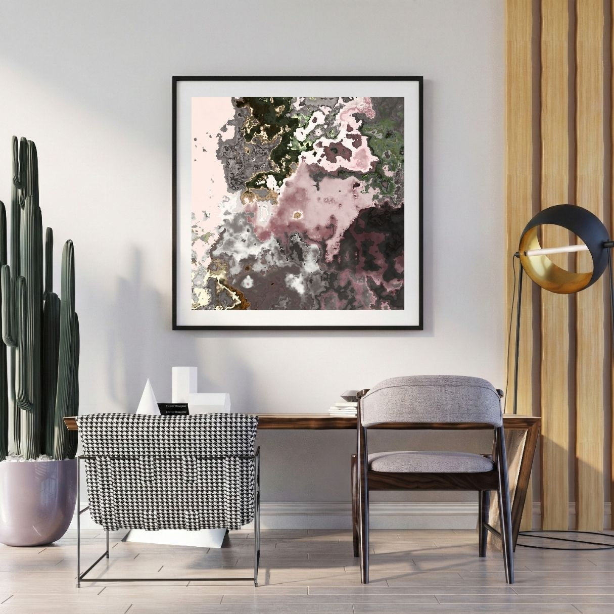 Modern interior with abstract art, chairs, and a potted plant.