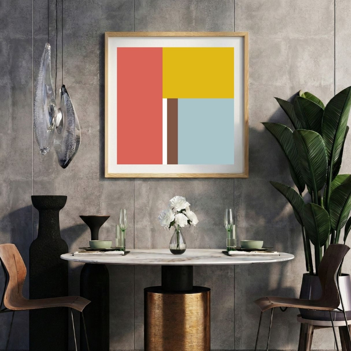 Modern interior with a multicolor striped print on a gray wall, marble table, and decorative items.