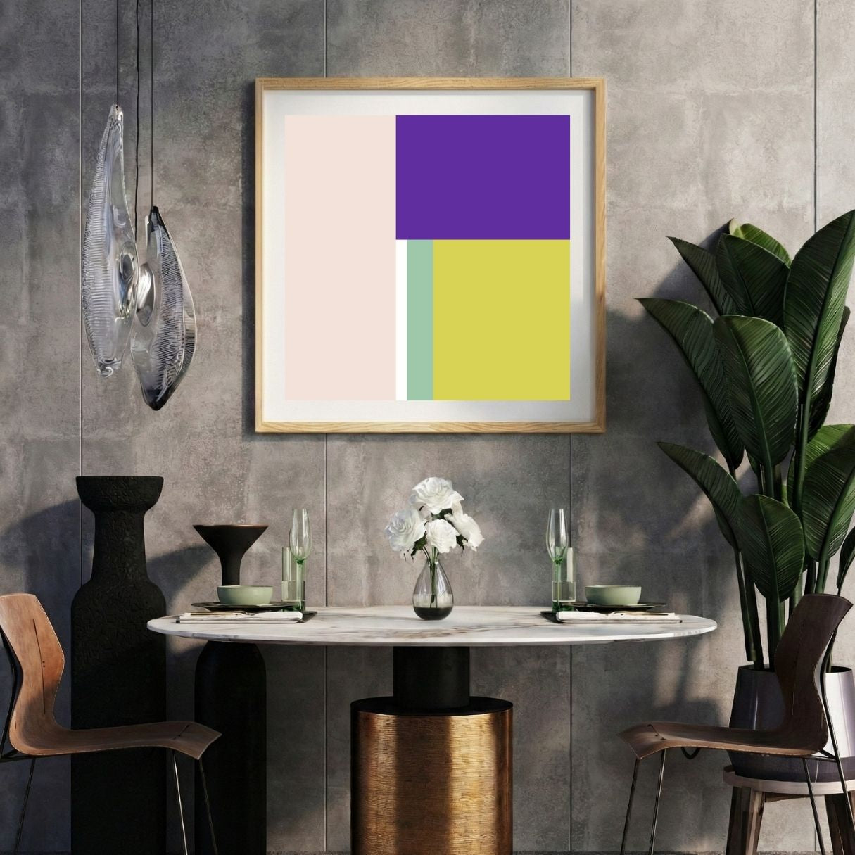 Modern interior with a multicolor striped print on a gray wall, marble table, and decorative items.