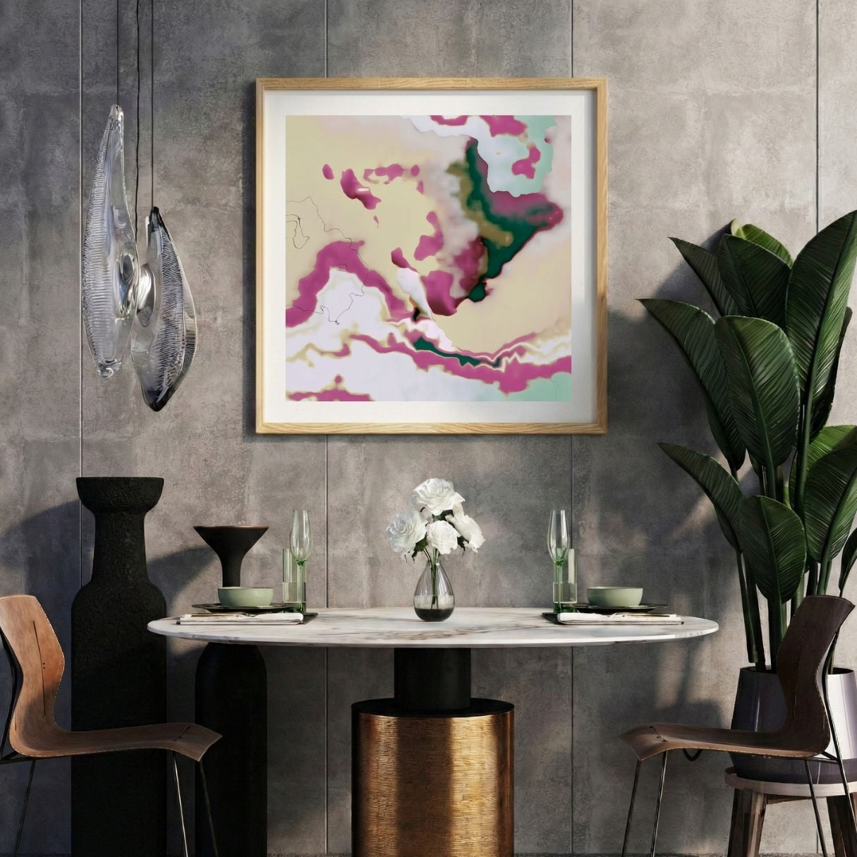 Modern interior with a colorful abstract print on a gray wall, marble table, and decorative items.