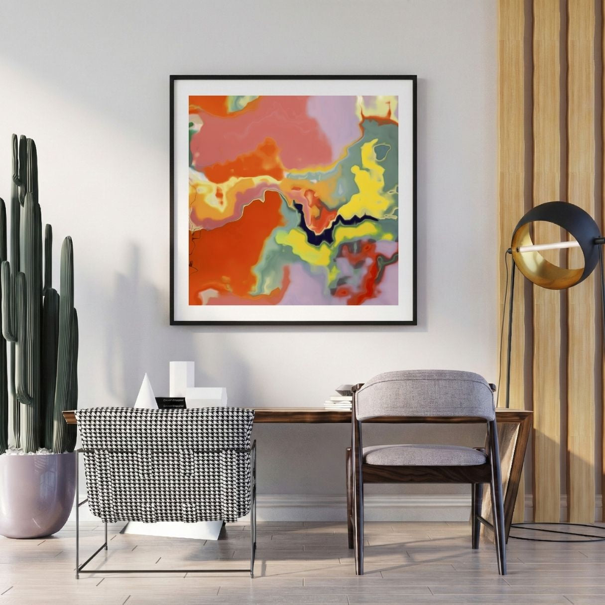 Modern interior with abstract art print, chairs, and decor items.