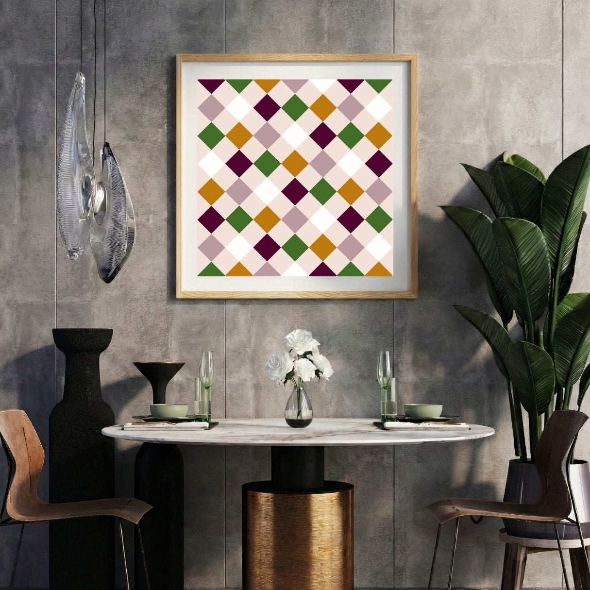 Modern interior with a brown geometric print on a gray wall, marble table, and decorative items.
