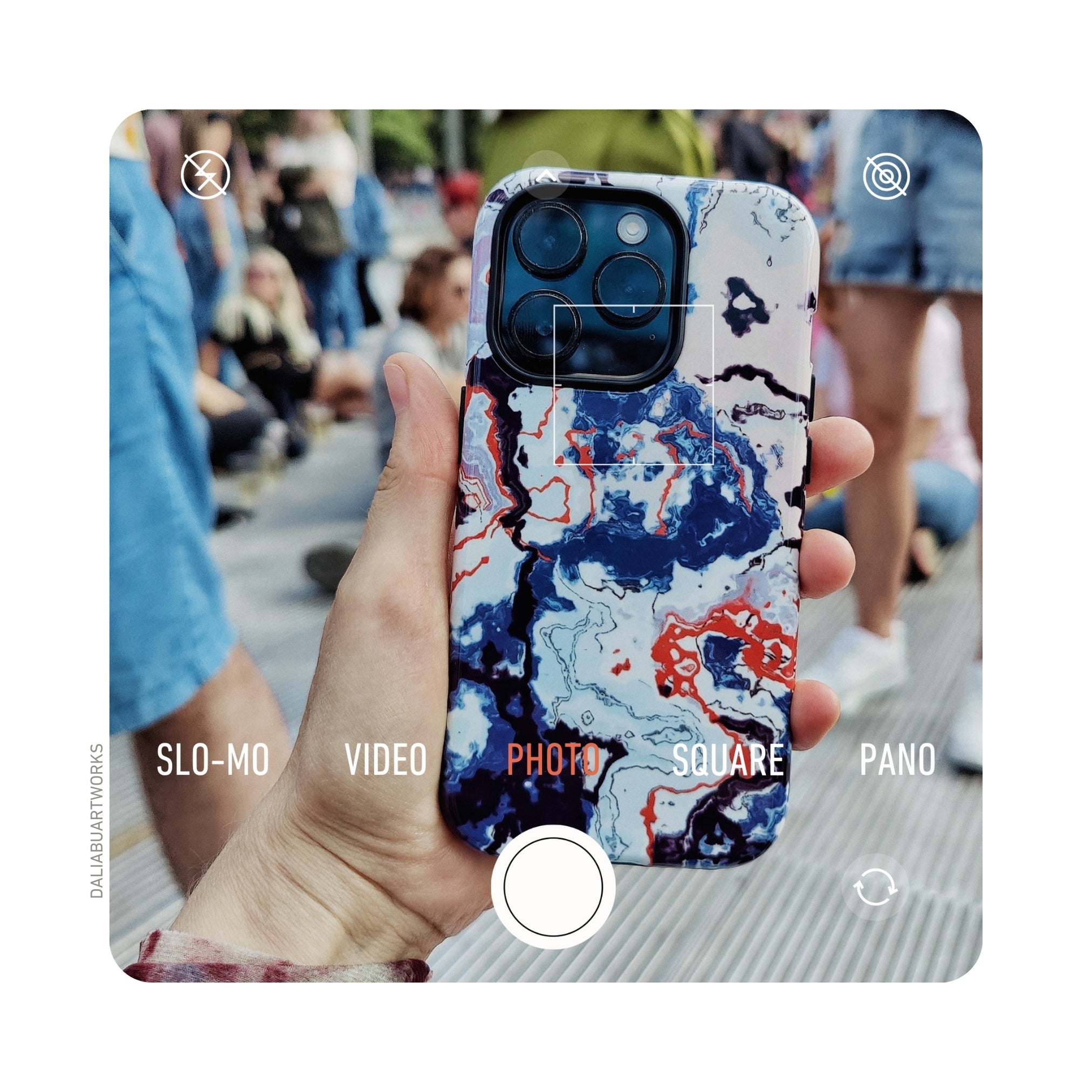 Ultra-thin snap phone case from the Blue Marble #1 collection. The artistic design features an abstract blue marble pattern created from an original painting. Main colors include shades of blue, red, and pink, giving the case a unique, artistic appeal.