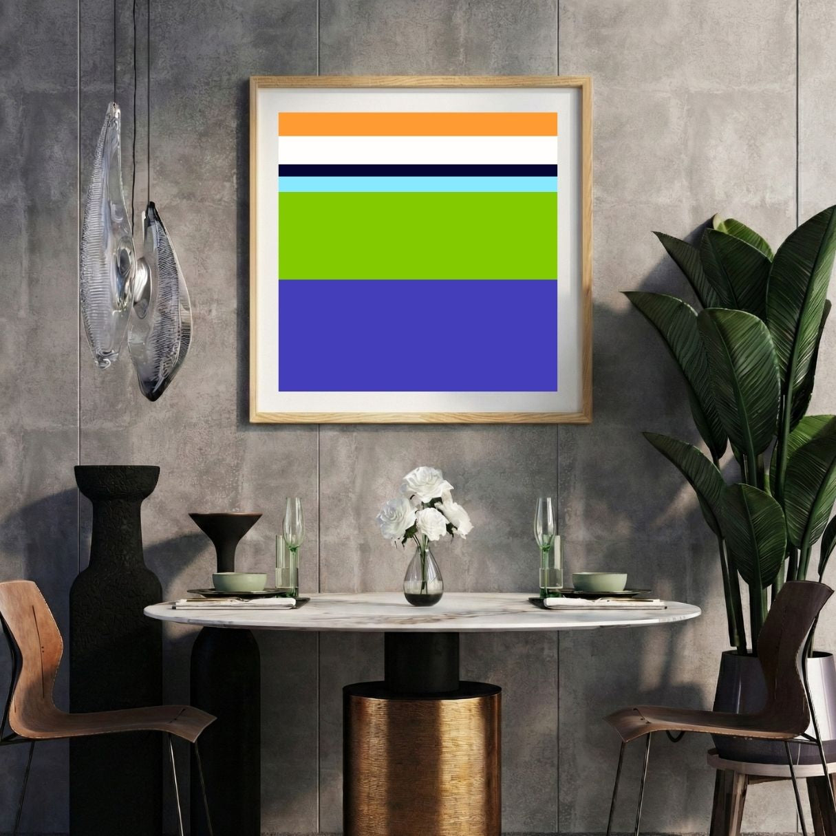 Modern interior with a multicolor striped print on a gray wall, marble table, and decorative items.