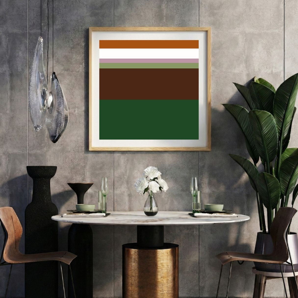 Modern interior with a green brown striped print on a gray wall, marble table, and decorative items.