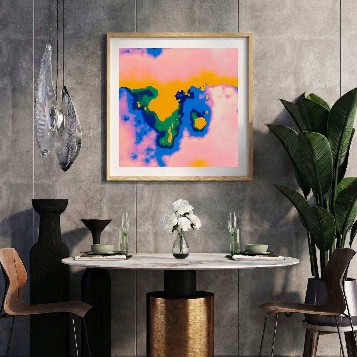 Modern interior with abstract art, table, chairs, and decorative items against a gray wall.