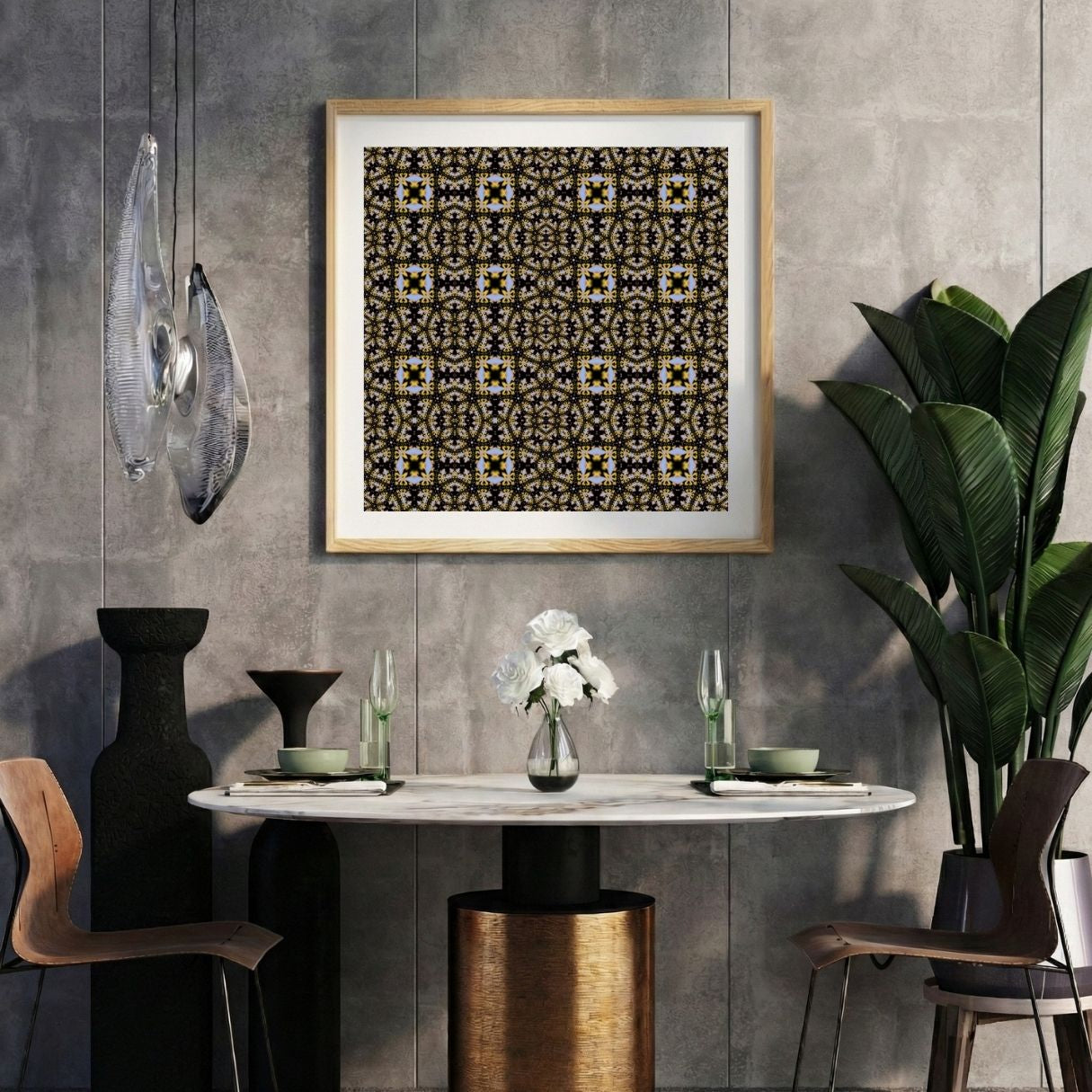 Modern interior with a ornamental print on a gray wall, marble table, and decorative items.