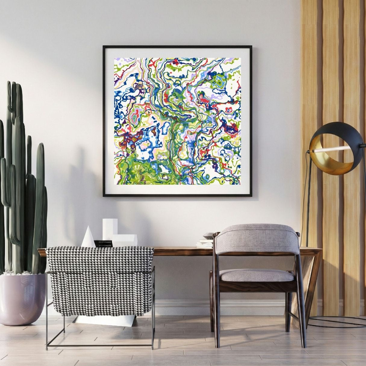 Modern interior with a abstract art print on the wall, chair, and potted plant.