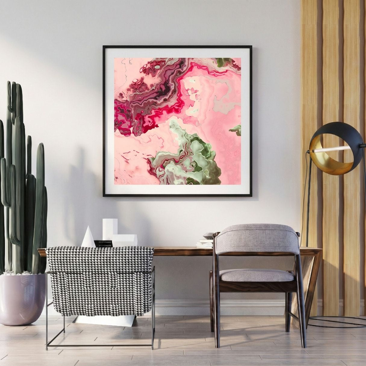 Modern interior with a abstract art print on the wall, chair, and potted plant.