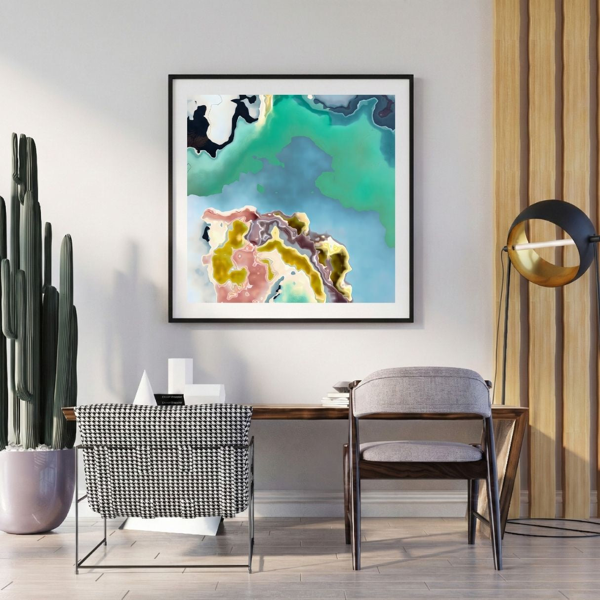Modern interior with a abstract art print on the wall, chair, and potted plant.