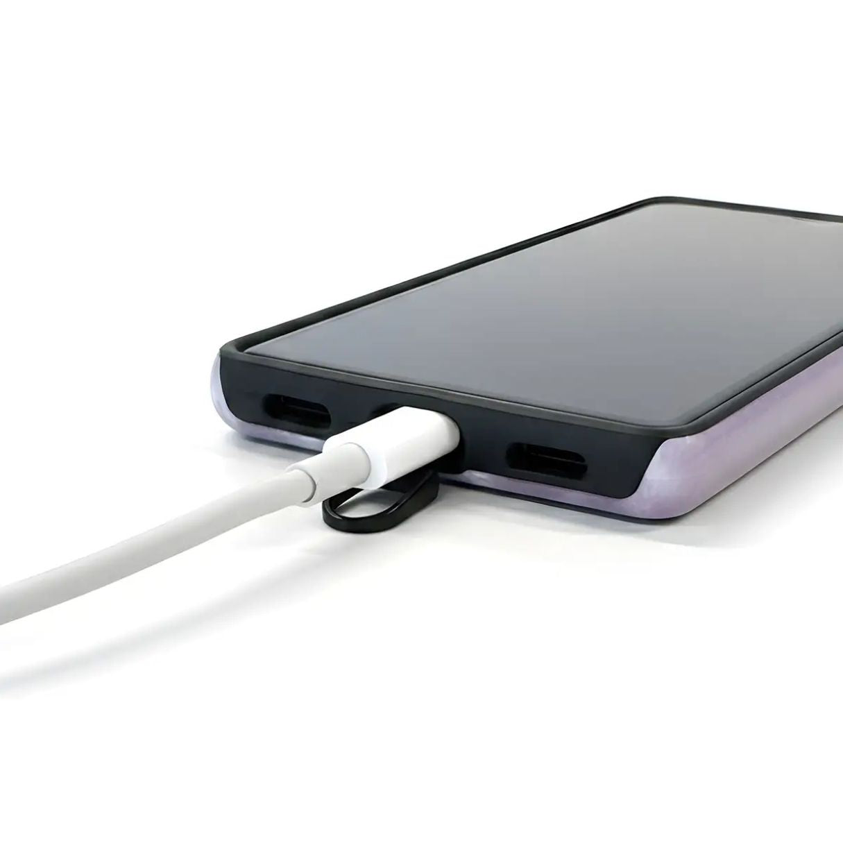 Smartphone with a charging cable connected on a white background.