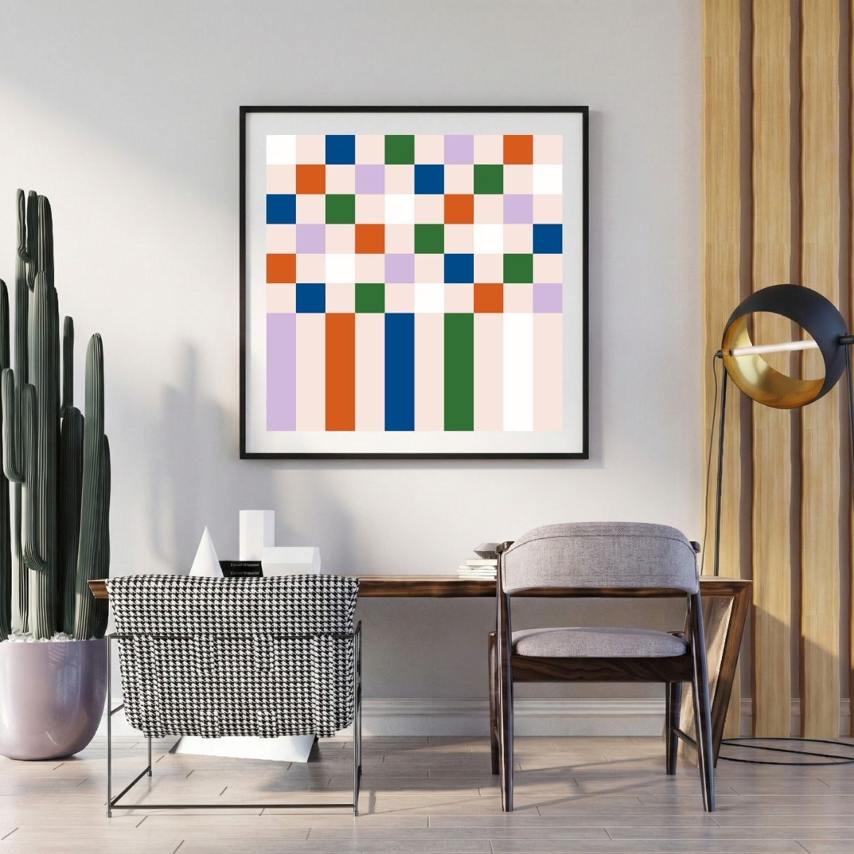 Modern interior with a colorful abstract art piece on the wall, a desk, and chairs.
