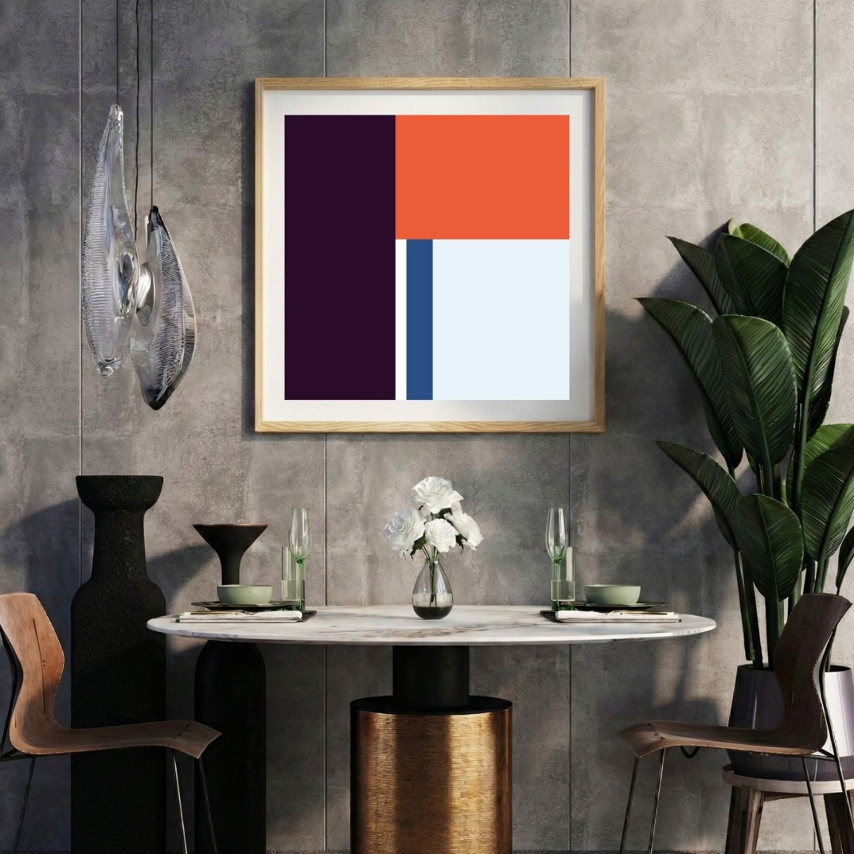 Modern interior with a purple red striped print on a gray wall, marble table, and decorative items.