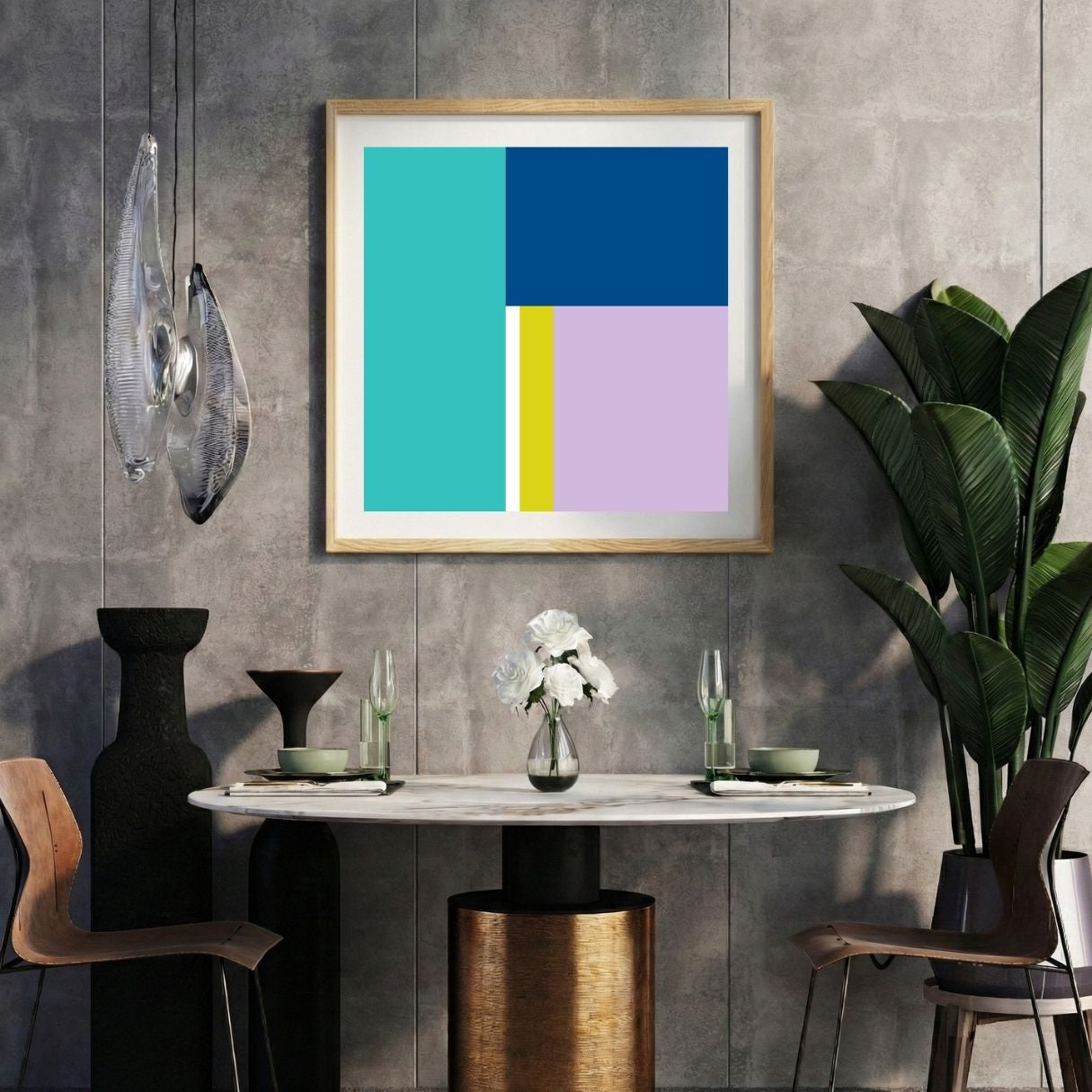 Modern interior with a teal blue striped print on a gray wall, marble table, and decorative items.