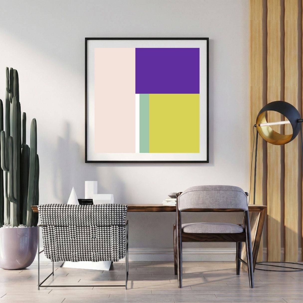 Modern interior with abstract art, chair, and potted plant on a light gray wall.