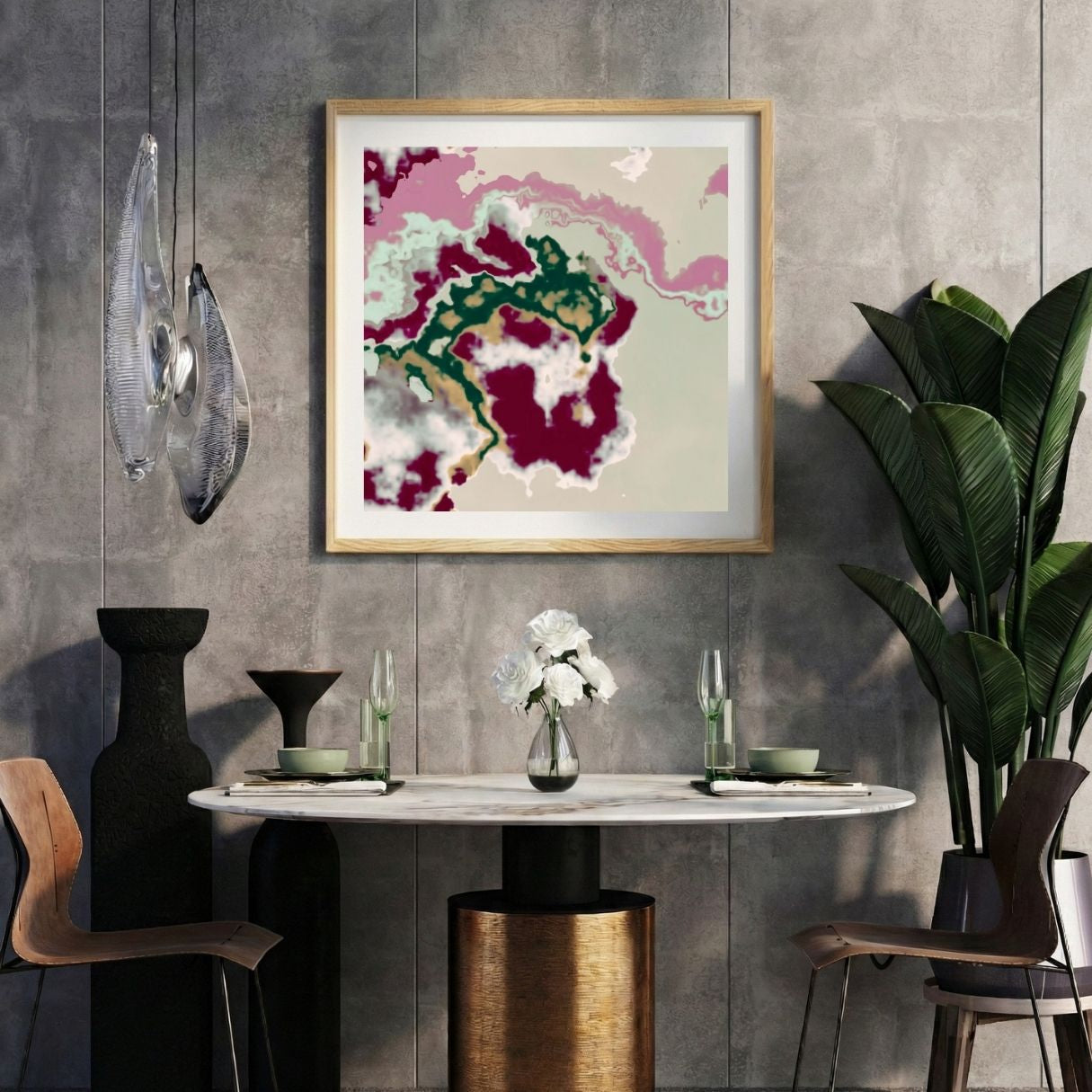 Modern interior with a colorful abstract print on a gray wall, marble table, and decorative items.