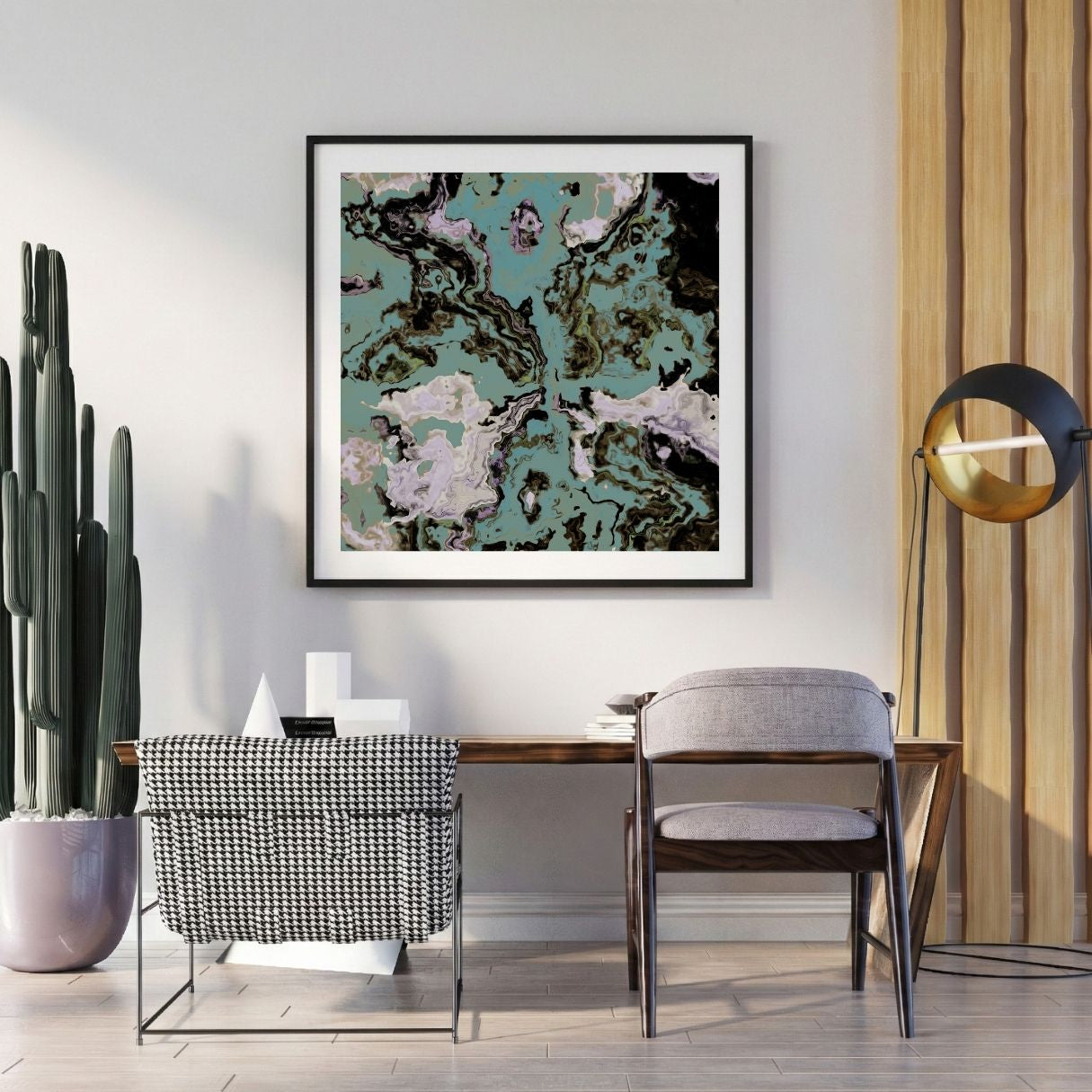 Modern interior with a abstract art print on the wall, chair, and potted plant.